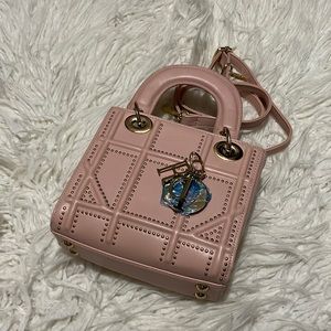 Square lady bag with charm